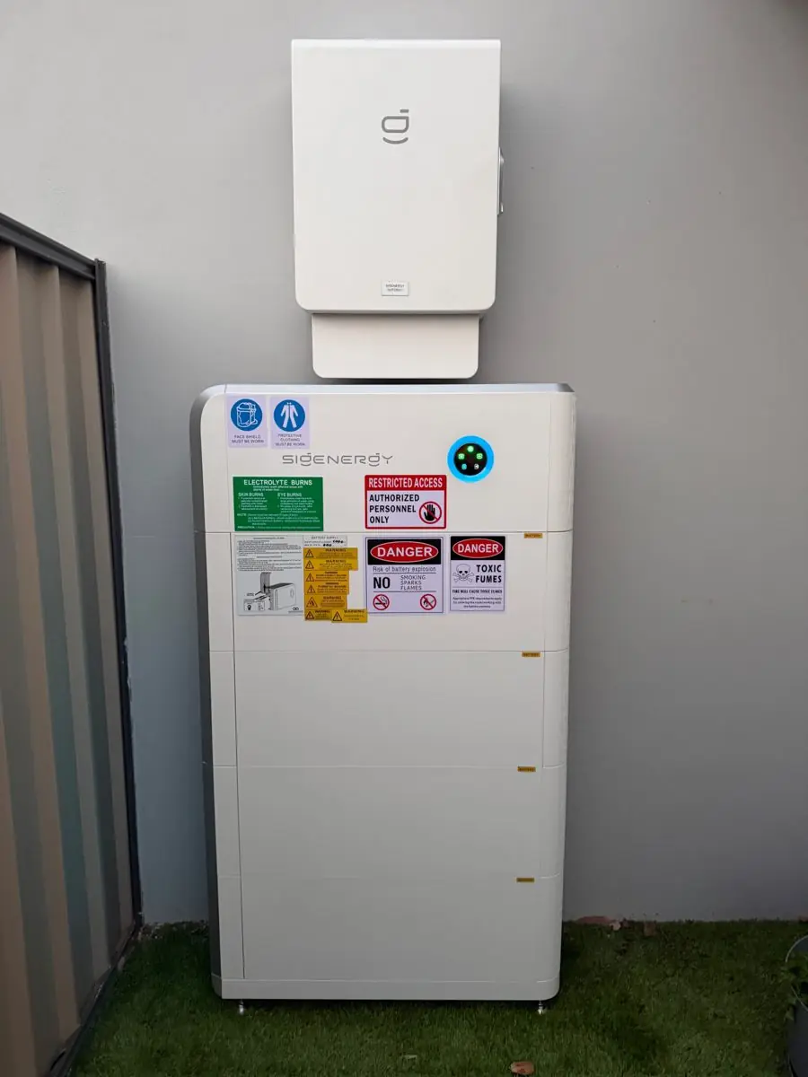 Sigenergy SigenStor battery stack with gateway on an outdoor wall